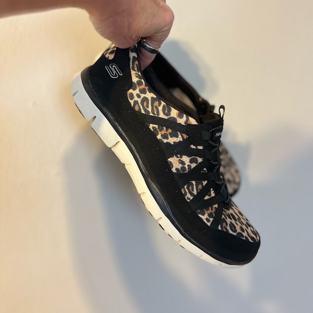 Skechers Black and Tan Sneakers with Bold Pattern